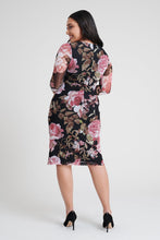 Load image into Gallery viewer, woman-wearing-connected-apparel-Amber Floral Print Dress-posing-on-plain-background